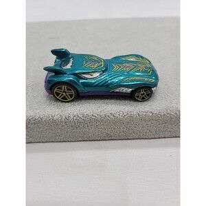 Hot Wheels Howlin Heat 2010 1:64 Diecast Metallic Green / Purple Car